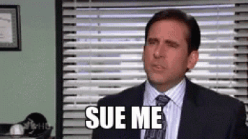 a man in a suit and tie is sitting in front of a window and saying sue me .