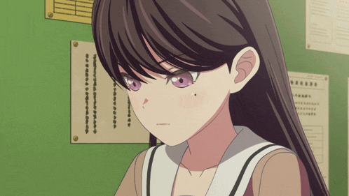 a girl with long hair and purple eyes is looking at something