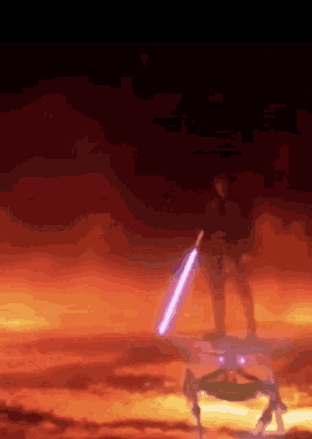 a person holding a lightsaber in front of a burning sky
