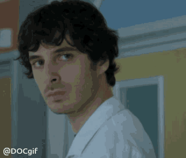 a close up of a man 's face with the hashtag docgif below him