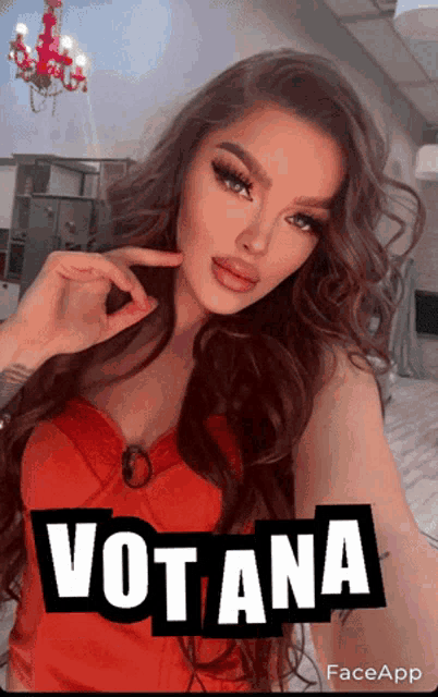 a woman in a red top with the word votana on it
