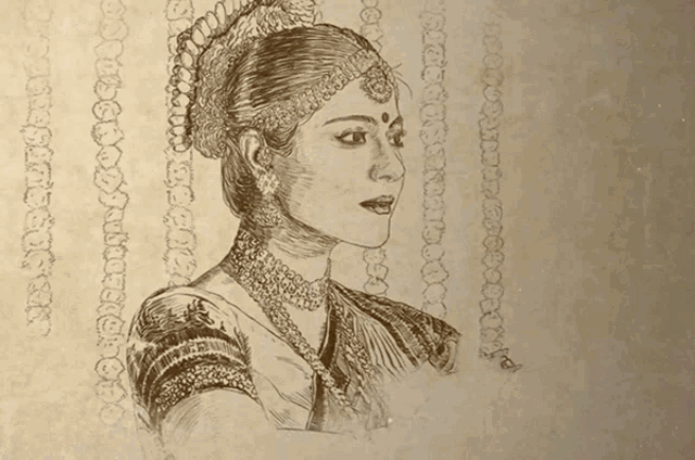 a drawing of a woman with a bindi on her forehead is on a piece of paper