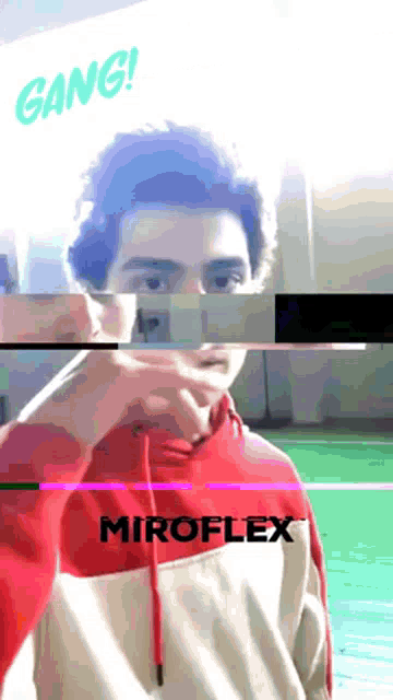 a man in a red and white hoodie with the word miroflex on the bottom