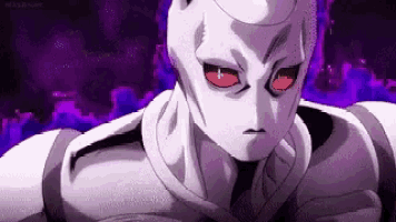 a close up of a cartoon character with red eyes .