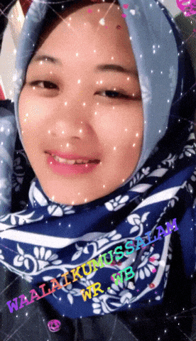 a woman wearing a blue and white scarf has the words waalaikumussalam written on her face