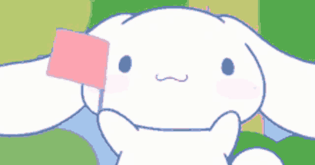 a cartoon of a white rabbit with pink cheeks and a pink tongue .