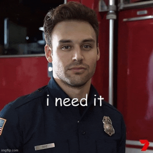 a man in a fireman 's uniform is standing in front of a red truck and says i need it