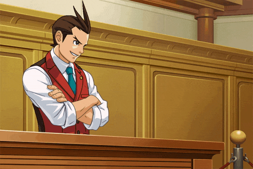 a man in a red vest and tie is standing in a courtroom with his arms crossed