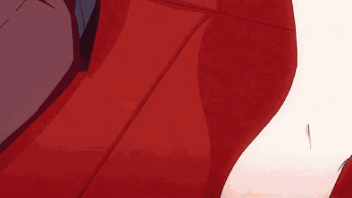 a close up of a person 's torso and legs in a suit and tie .