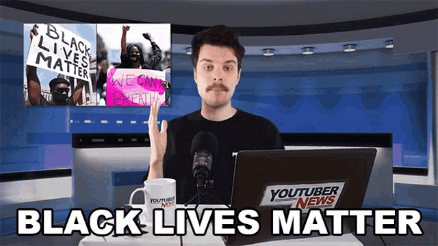 a man stands in front of a laptop that says youtube news