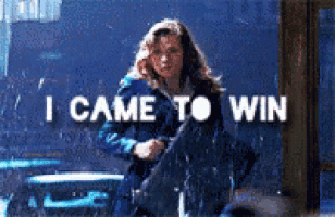 a woman running in the rain with the words " i came to win " above her