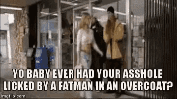 a man and a woman are standing next to each other in a store and talking .