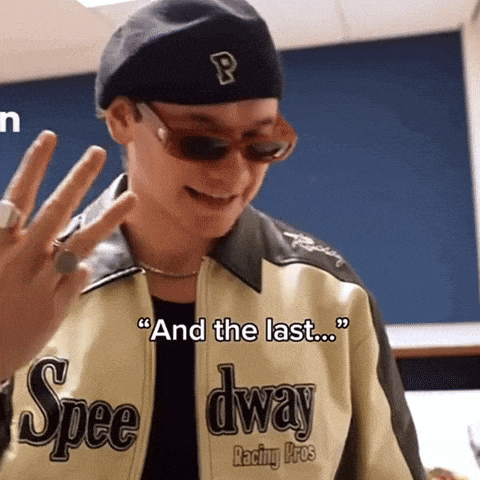 a man wearing sunglasses and a speedway jacket says and the last