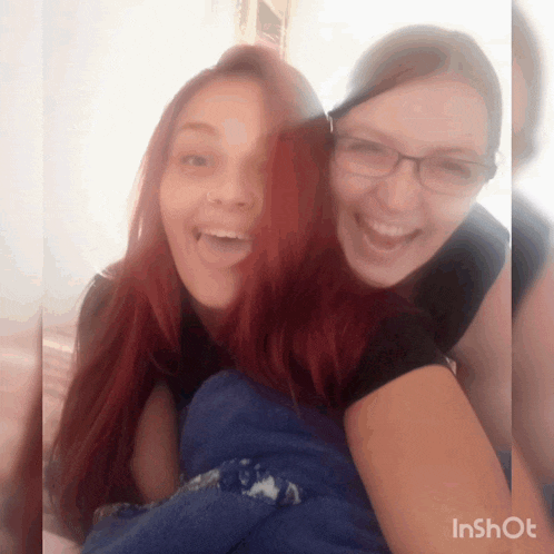 two girls are posing for a picture with the words inshot at the bottom of the image
