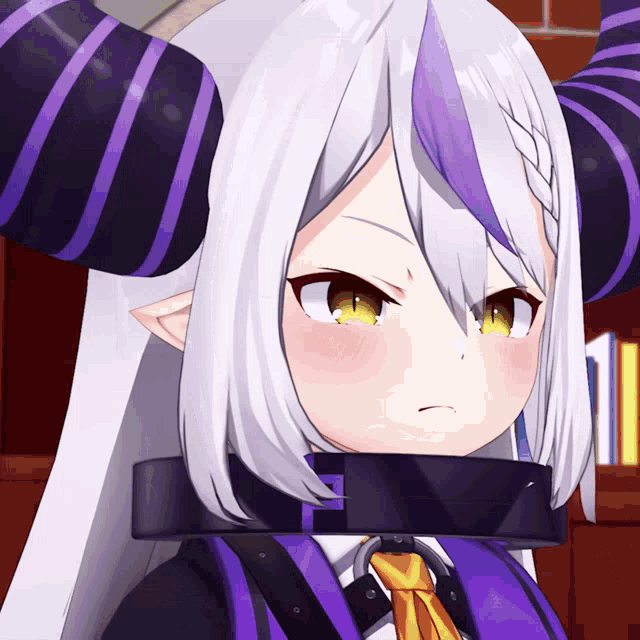 a close up of a cartoon character with horns and a collar around her neck