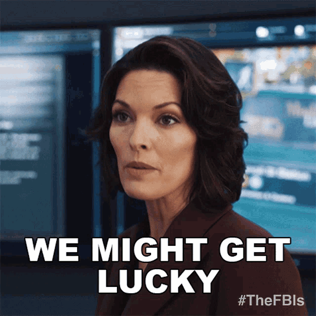a woman says we might get lucky in front of a monitor