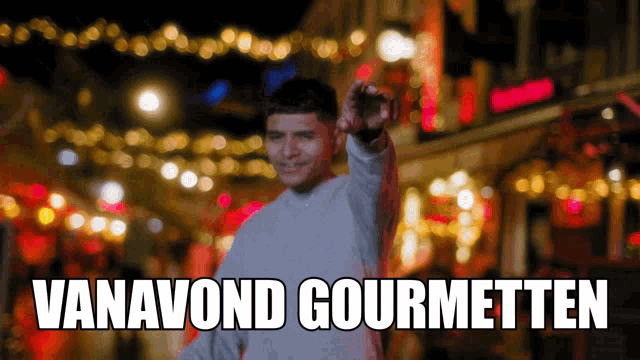 a man giving a thumbs up with the words vanavond gourmetten written below him