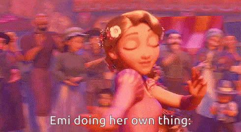 a little girl is dancing in front of a crowd with the words `` emi doing her own thing '' written on the bottom .
