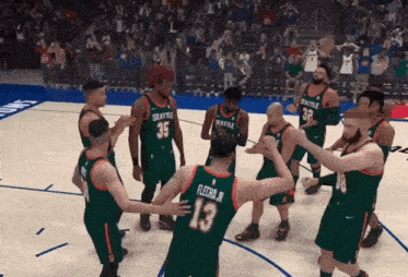 a group of seattle basketball players are celebrating on the court