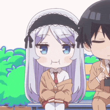 a girl with white hair is sitting next to a boy