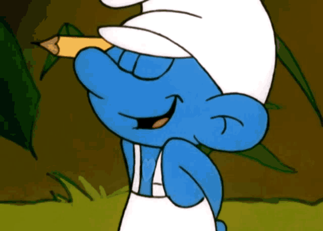 a smurf holding a pencil in his mouth