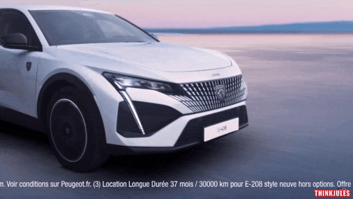 a white peugeot car is advertised on a website