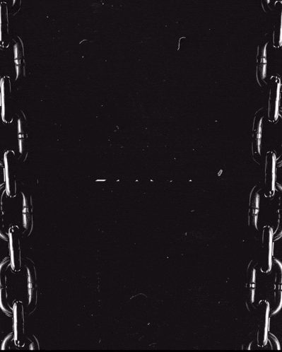 a black and white photo of a chain around a letter h