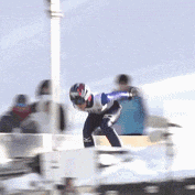 a blurred image of a person skiing down a snowy hill