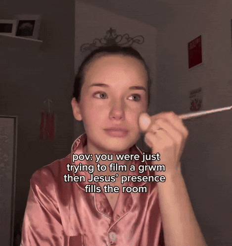 a woman applying makeup with a caption that says pov you were just