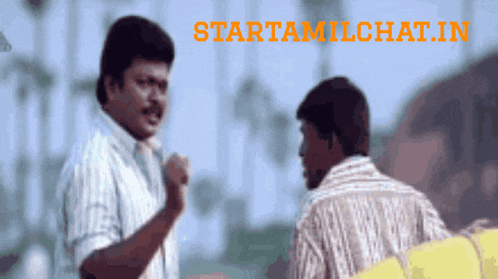 two men are having a conversation in front of a sign that says startamlchat.in
