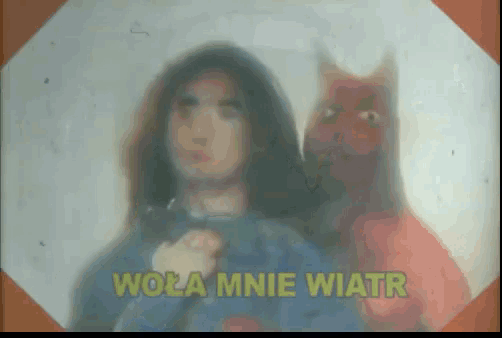 a painting of a woman and a squirrel with wola mnie wiatr written in green letters