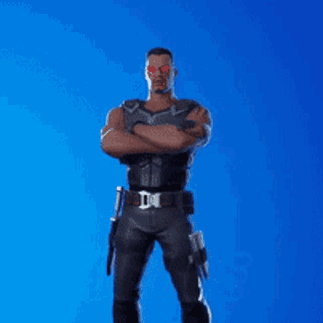 a man in a superhero costume is dancing with his arms outstretched