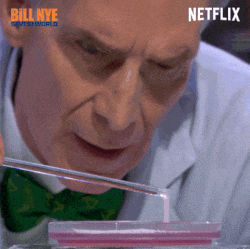 a close up of a man with a netflix logo in the corner of his face