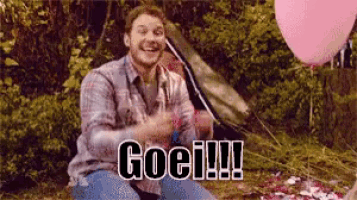a man in a plaid shirt is holding balloons and says goci