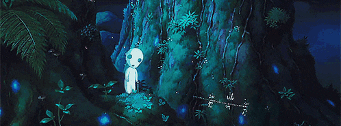 a group of ghosts standing next to a tree in a forest .