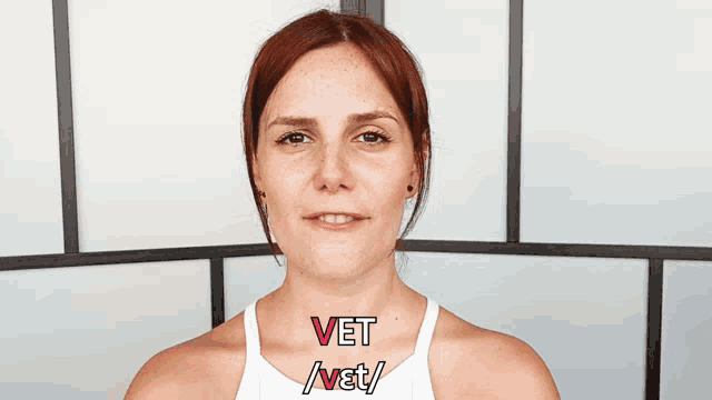 a woman with vet / vet written on her chest