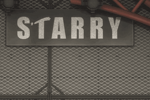 a sign on a wall that says starry in white letters