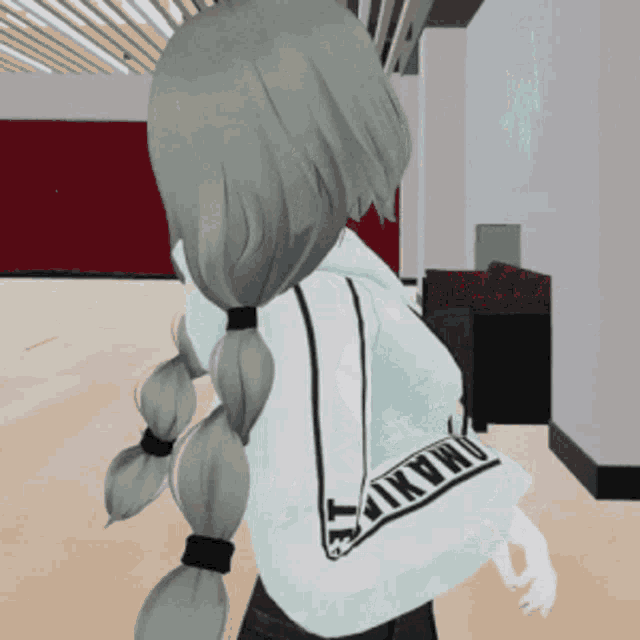 a girl with gray hair is wearing a hoodie with the word takumi on the back