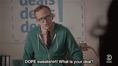 a man in a green sweatshirt and tie is asking what is your deal