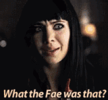 a woman with long black hair is smiling and saying `` what the fae was that ? ''
