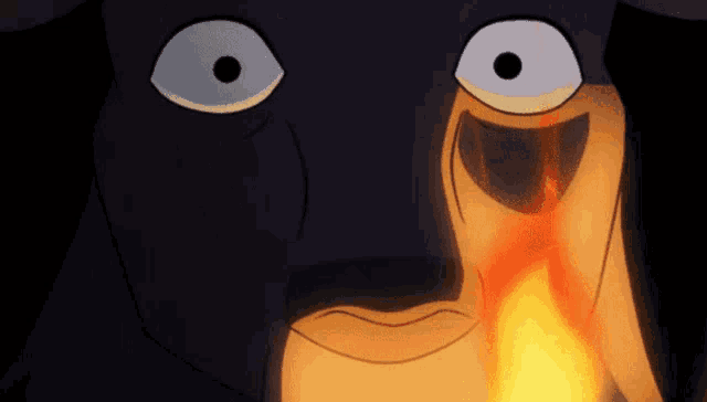 a close up of a cartoon character 's face with a fire coming out of it