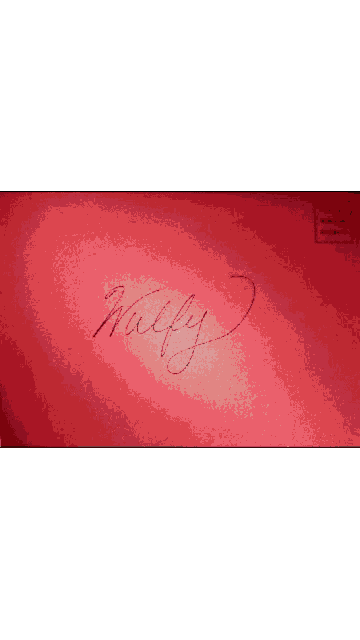 a red envelope with a silver circle in the center