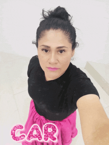 a woman wearing a black shirt and a pink skirt has the word car written in pink letters