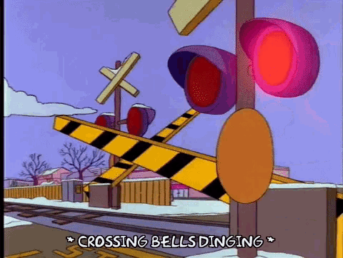 a cartoon of a crossing with the words crossing bells dinging above it