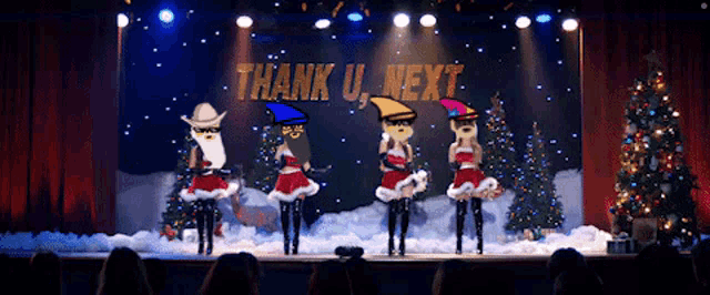 a group of cartoon characters on a stage with the words thank u next behind them