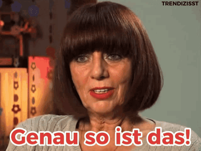 a woman says " genau so ist das " in front of her face