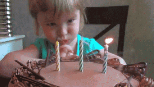 Blow Out The Candles GIF - Kid Cake Child GIFs