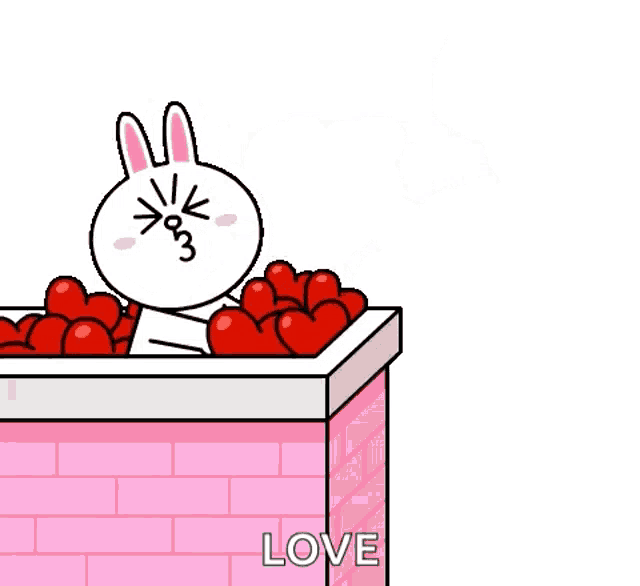 a cartoon rabbit is blowing a kiss while sitting in a box of hearts .