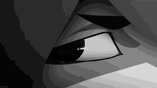 a black and white image of a cartoon eye