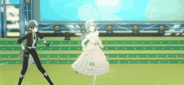 a man and a girl are dancing on a stage